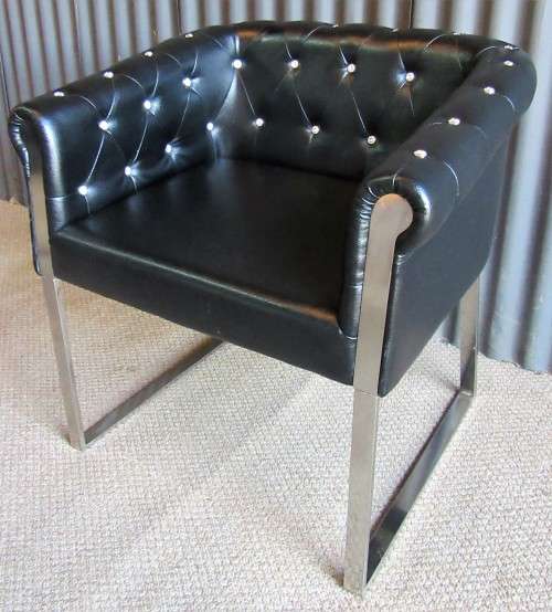 A ELGANT & STYLISH BAKOS BROTHERS STAINLESS STEEL AND FOW LEATHER OCASIONAL CHAIR