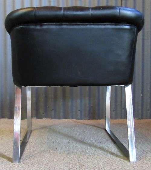 A ELGANT & STYLISH BAKOS BROTHERS STAINLESS STEEL AND FOW LEATHER OCASIONAL CHAIR