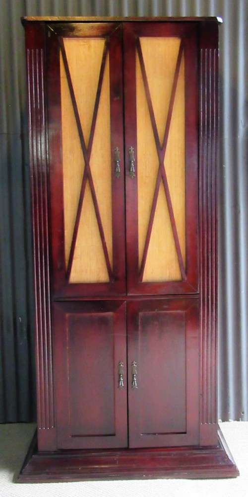 A ELGANT AND TALL FOUR DOOR CUPBOARD THAT CAN BE USE FOR TV OR LIQOUR CABINET WILL ALSO FOR OFFICE