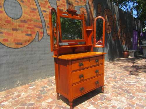 Gorgeous 1920's Solid Satinwood with the original bevelled Mirrors, Handles and wood Casters.