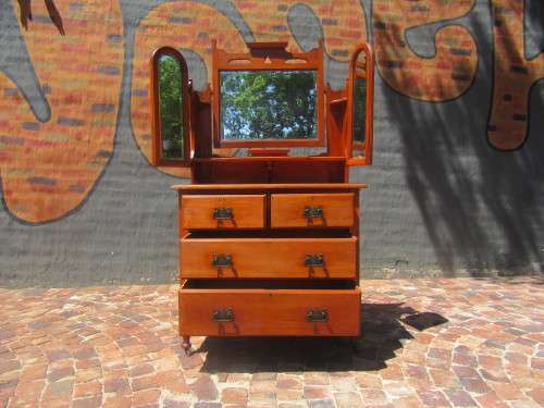 Gorgeous 1920's Solid Satinwood with the original bevelled Mirrors, Handles and wood Casters.