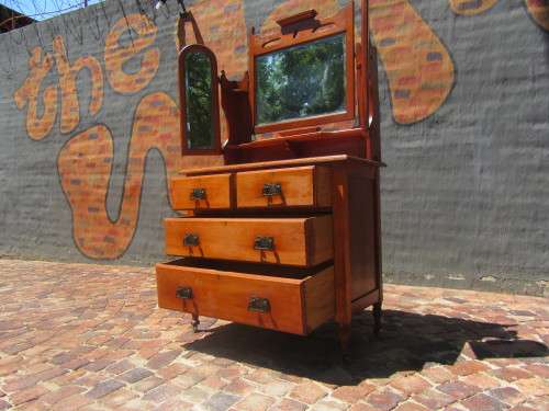Gorgeous 1920's Solid Satinwood with the original bevelled Mirrors, Handles and wood Casters.