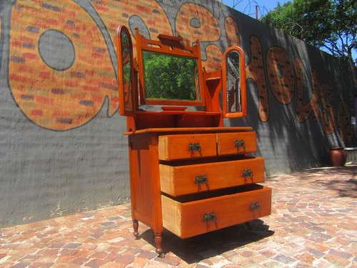 Gorgeous 1920's Solid Satinwood with the original bevelled Mirrors, Handles and wood Casters.