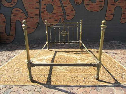Antique Brass double bet on original casters