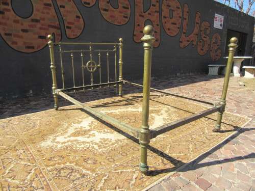 Antique Brass double bet on original casters