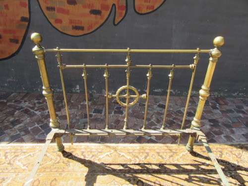 Antique Brass double bet on original casters