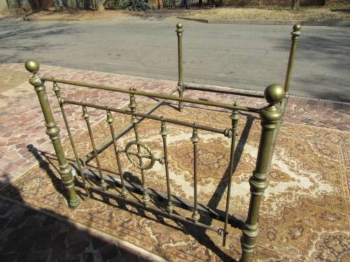 Antique Brass double bet on original casters