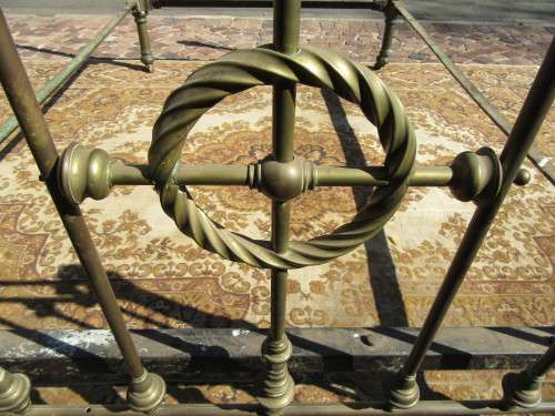 Antique Brass double bet on original casters