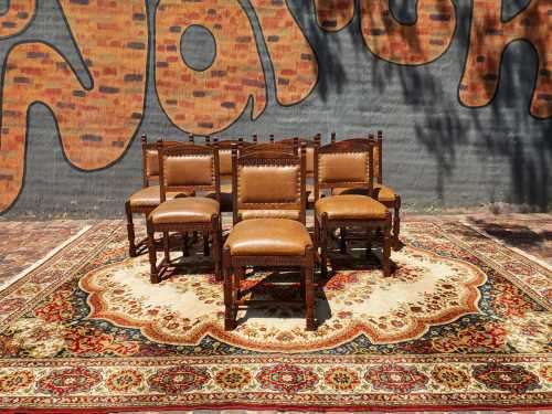 Stunning 8 seater Rhodesian Teak? Dining room table and chairs covered in leather.  R12950  +/- Heig