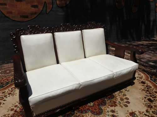 Beautifully carved three-seater imbuia Ball and Claw in good condition