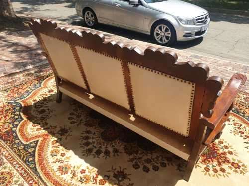 Beautifully carved three-seater imbuia Ball and Claw in good condition