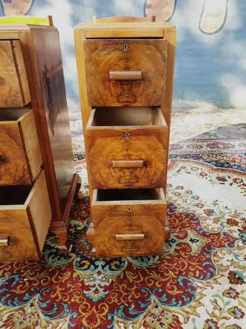 Pair of tall Art Deco wall nut finished pedestals