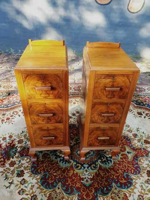 Pair of tall Art Deco wall nut finished pedestals