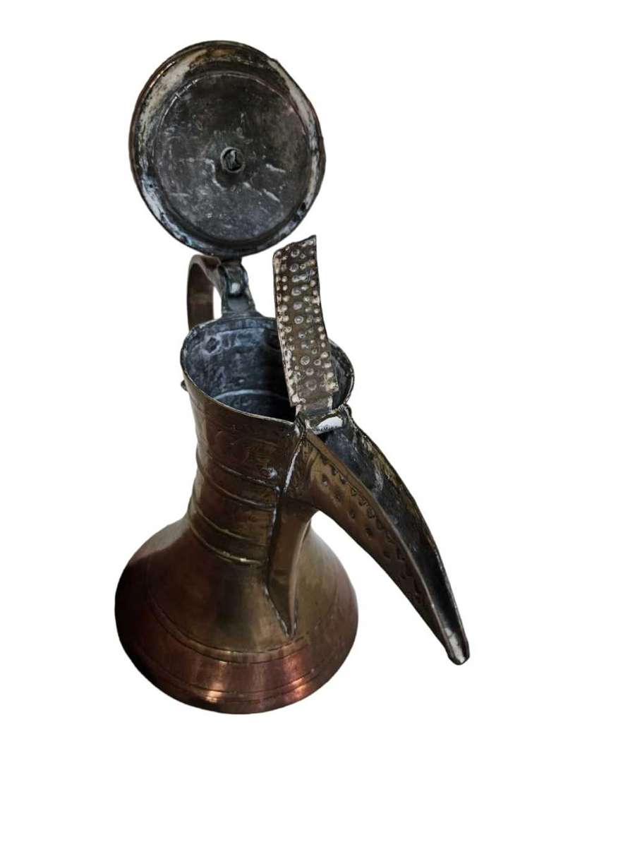 A Turkish / Islamic copper dallah coffee pot