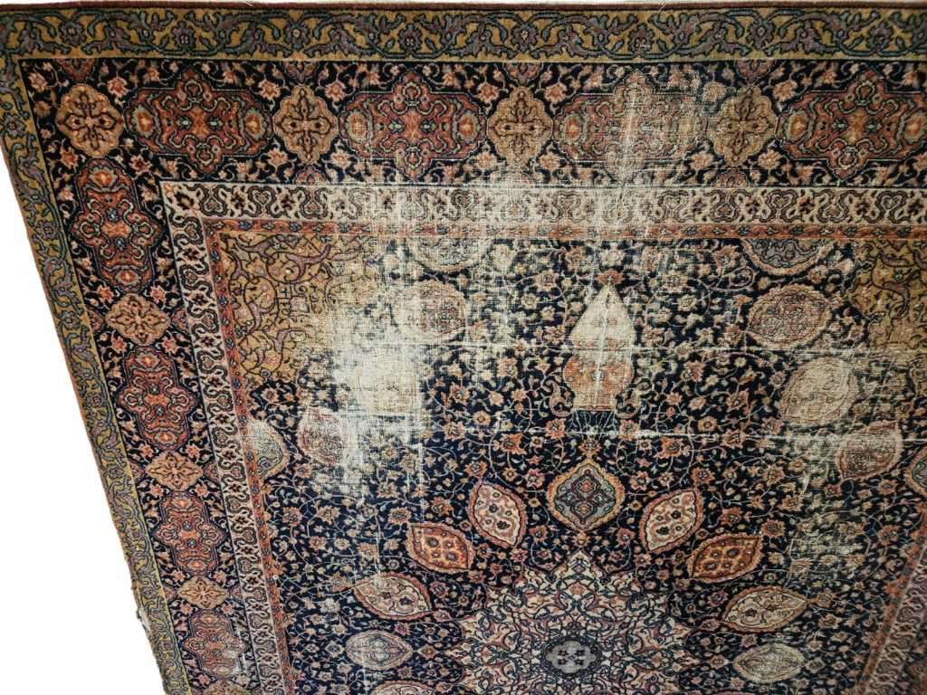 Add some vintage charm to your home with our very large worn Persian style machine-made carpet