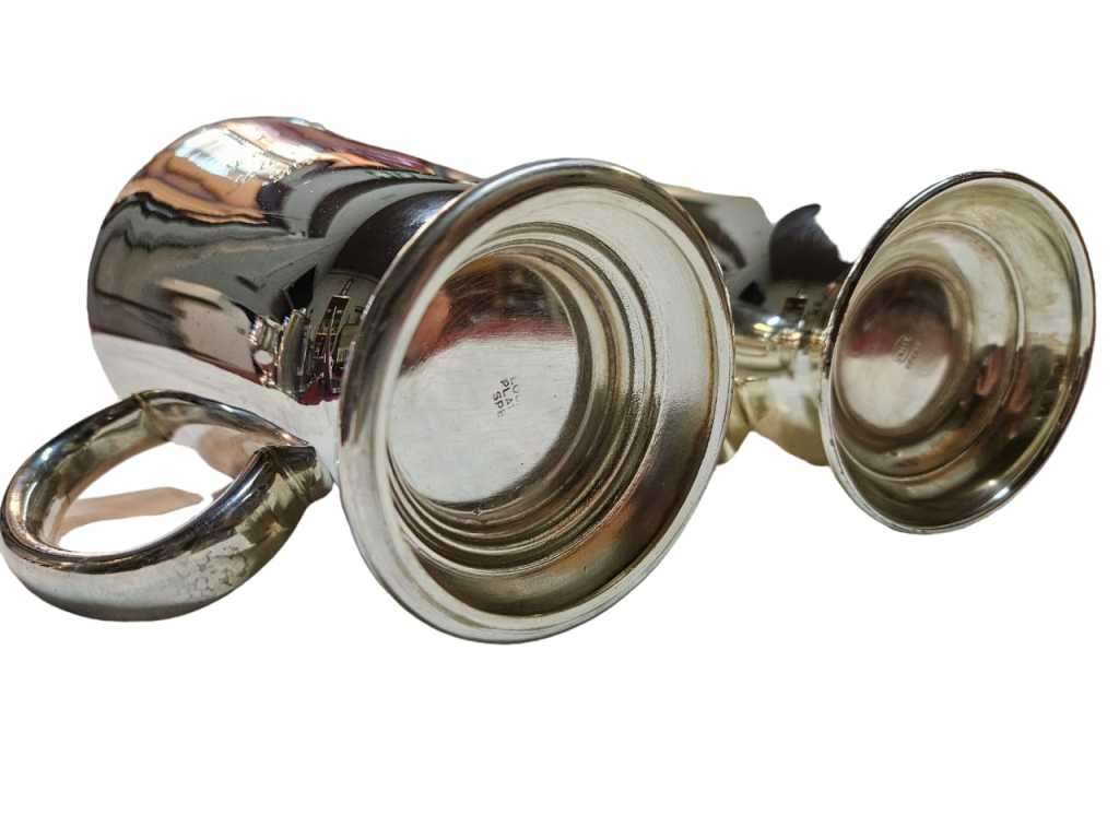 Elevate your beer drinking experience with this stunning pair of silver plated beer mugs.