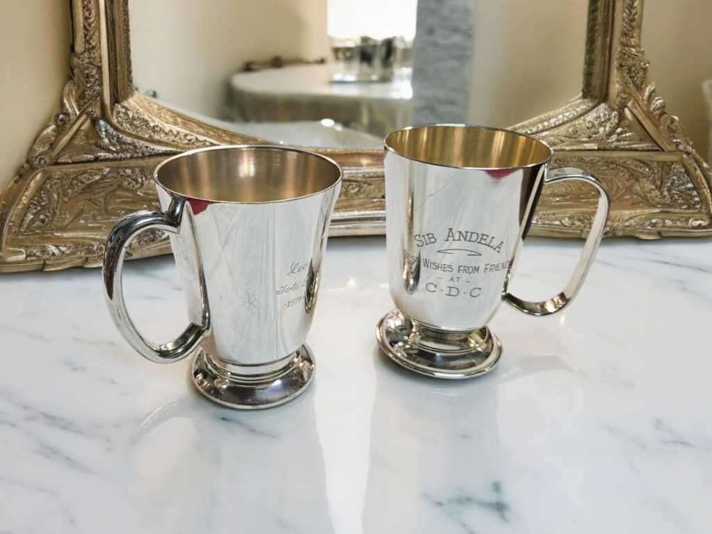 Elevate your beer drinking experience with this stunning pair of silver plated beer mugs.
