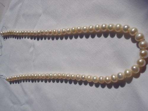 VERY ATTRACTIVE PEARL NECKLACE 104.85CT