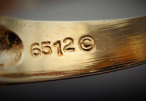 BLUE SAPPHIRE AND DIAMND FLOWER RING. 9ct GOLD