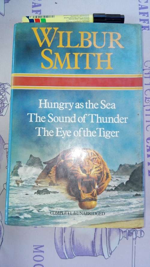 WILBUR SMITH THREE BOOKS in ONE ,  Hungry as the Sea , The Sound of Thunder, The Eye of the Tiger