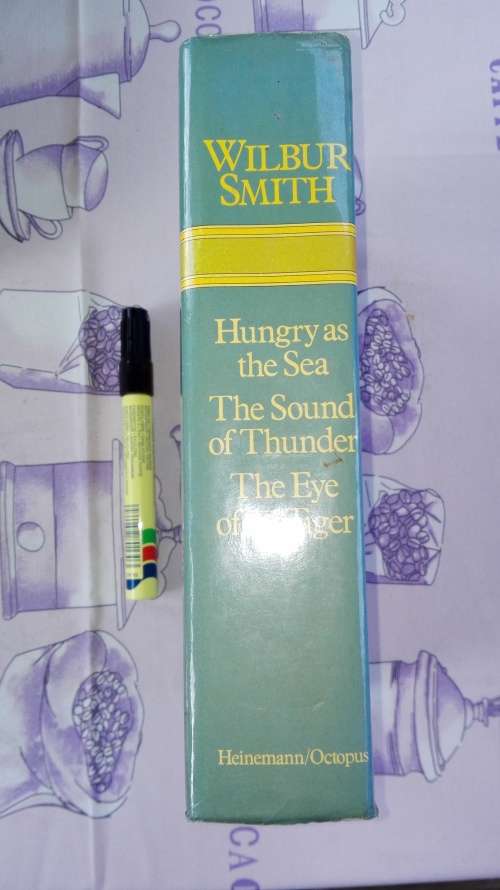 WILBUR SMITH THREE BOOKS in ONE ,  Hungry as the Sea , The Sound of Thunder, The Eye of the Tiger