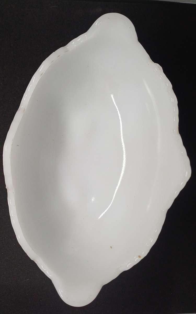 Milk glass bowl on feet