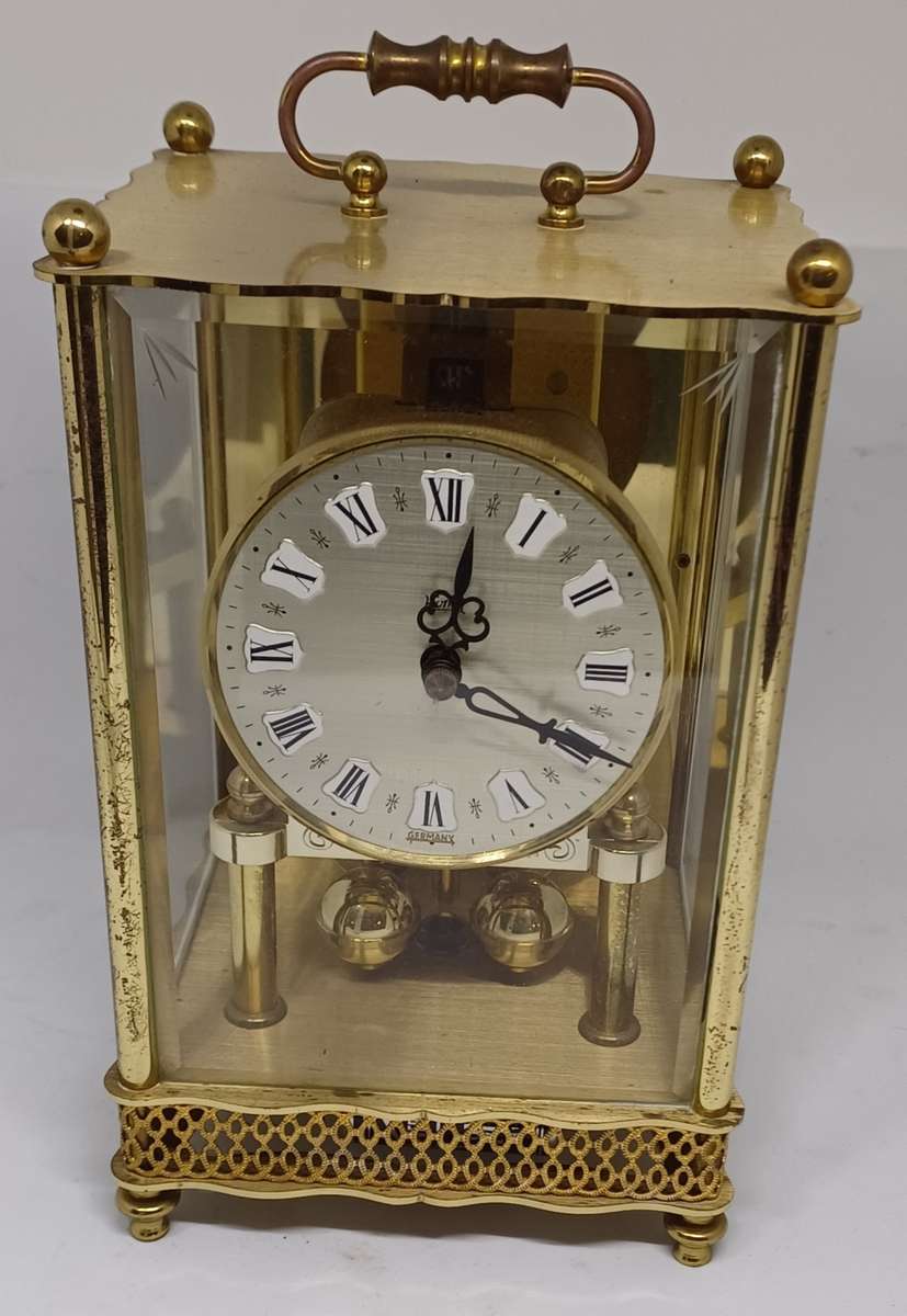 Rotating Pendulum clock