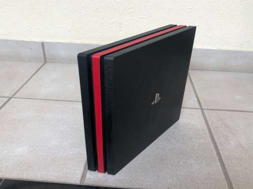 PlayStation 4 Pro + Controller + two games including cables + D-brand skin for R6000