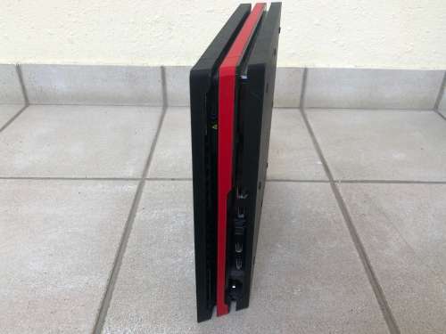 PlayStation 4 Pro + Controller + two games including cables + D-brand skin for R6000