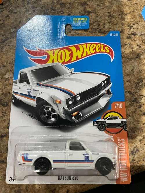 Hot Wheels Datsun 610 white.  Long card