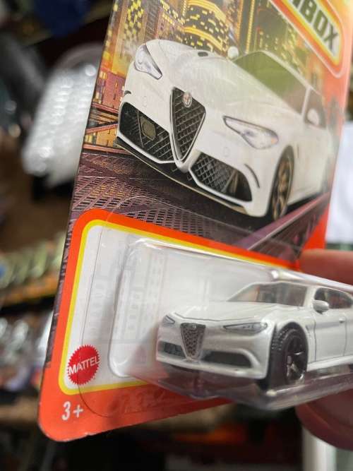 Matchbox Alfa Romeo white.  Long card import