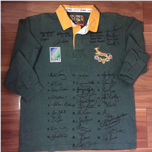 RUGBY WORLD CUP JERSEY 1995 SIGNED BY SPRINGBOKS AND NELSON MANDELA WITH COA