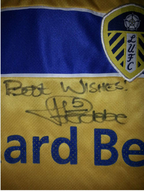 LUCAS RADEBE SIGNED LEEDS UNITED JERSEY - PACKARD BELL