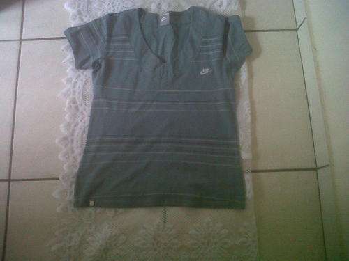 Nike ladies top size L small cut
