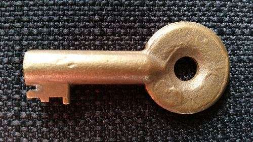 Tiny Brass Railroad Key - SA Lock Comp - Vintage All Cast Brass Raised - South African Railways