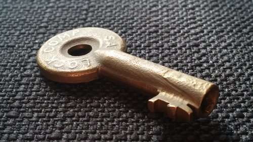 Tiny Brass Railroad Key - SA Lock Comp - Vintage All Cast Brass Raised - South African Railways