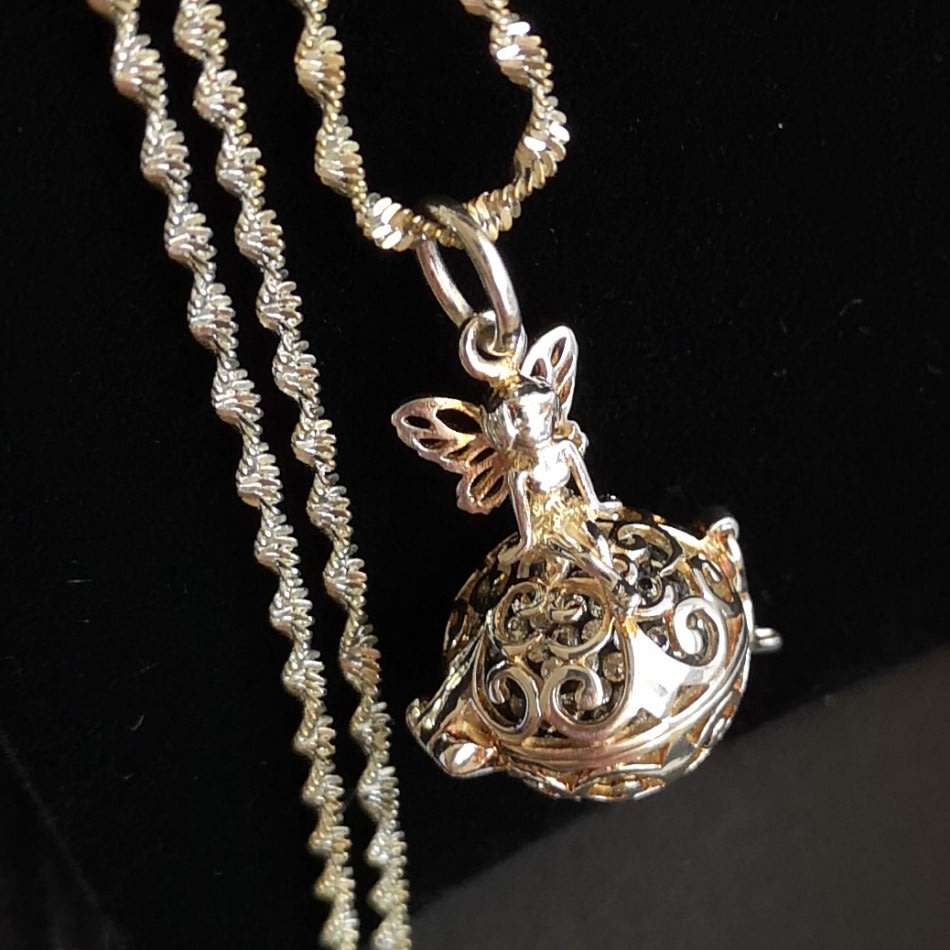 Beautiful Twisted Sterling Silver Necklace with Angel Pendant Locket holding a tiny Crystal Ball