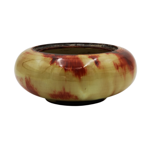 Linnware green and brown-glazed bowl in compressed circular form, authentic South African pottery