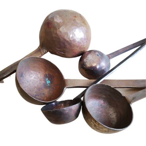 Set of 5 Middle Eastern hand crafted hammered copper ladles, early to mid 1900s