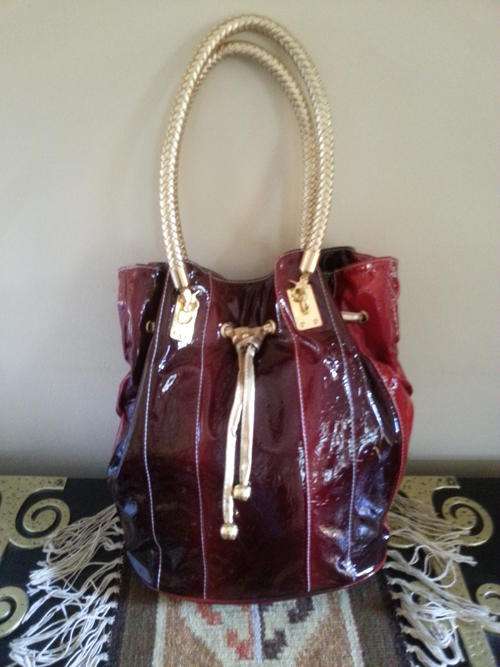 BARGAIN!!!Stunning faux red leather trendy handbag!