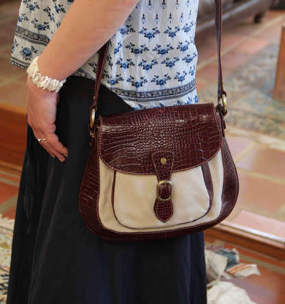 PAUL COSTELLOE DRESSAGE SADDLEBAG HANDBAG. CREAM FABRIC WEAVE WITH BURGUNDY PATENT LEATHER DETAILS
