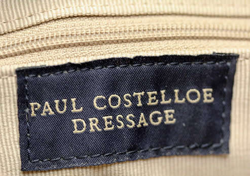 PAUL COSTELLOE DRESSAGE SADDLEBAG HANDBAG. CREAM FABRIC WEAVE WITH BURGUNDY PATENT LEATHER DETAILS