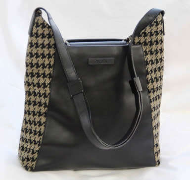 TUMI LEATHER AND HOUNDSTOOTH WOOL BUCKET HANDBAG. QUITE RARE! DUSTCOVER.