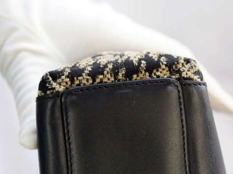 TUMI LEATHER AND HOUNDSTOOTH WOOL BUCKET HANDBAG. QUITE RARE! DUSTCOVER.