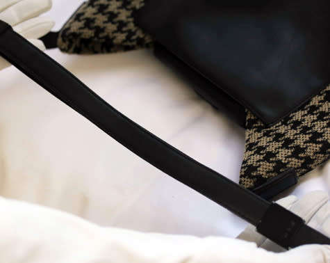 TUMI LEATHER AND HOUNDSTOOTH WOOL BUCKET HANDBAG. QUITE RARE! DUSTCOVER.