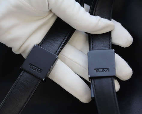 TUMI LEATHER AND HOUNDSTOOTH WOOL BUCKET HANDBAG. QUITE RARE! DUSTCOVER.