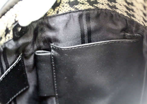 TUMI LEATHER AND HOUNDSTOOTH WOOL BUCKET HANDBAG. QUITE RARE! DUSTCOVER.