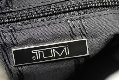 TUMI LEATHER AND HOUNDSTOOTH WOOL BUCKET HANDBAG. QUITE RARE! DUSTCOVER.