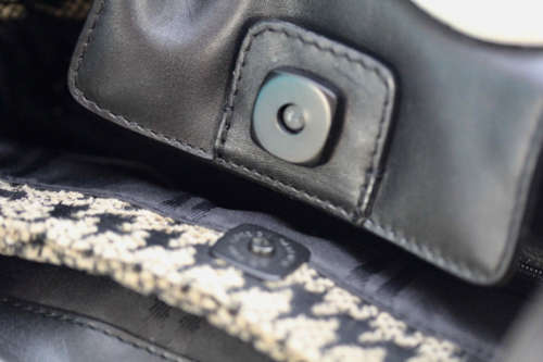 TUMI LEATHER AND HOUNDSTOOTH WOOL BUCKET HANDBAG. QUITE RARE! DUSTCOVER.