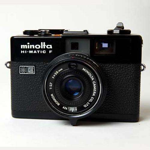 Black Minolta Hi-Matic F rangefinder with flash and tele lens!
